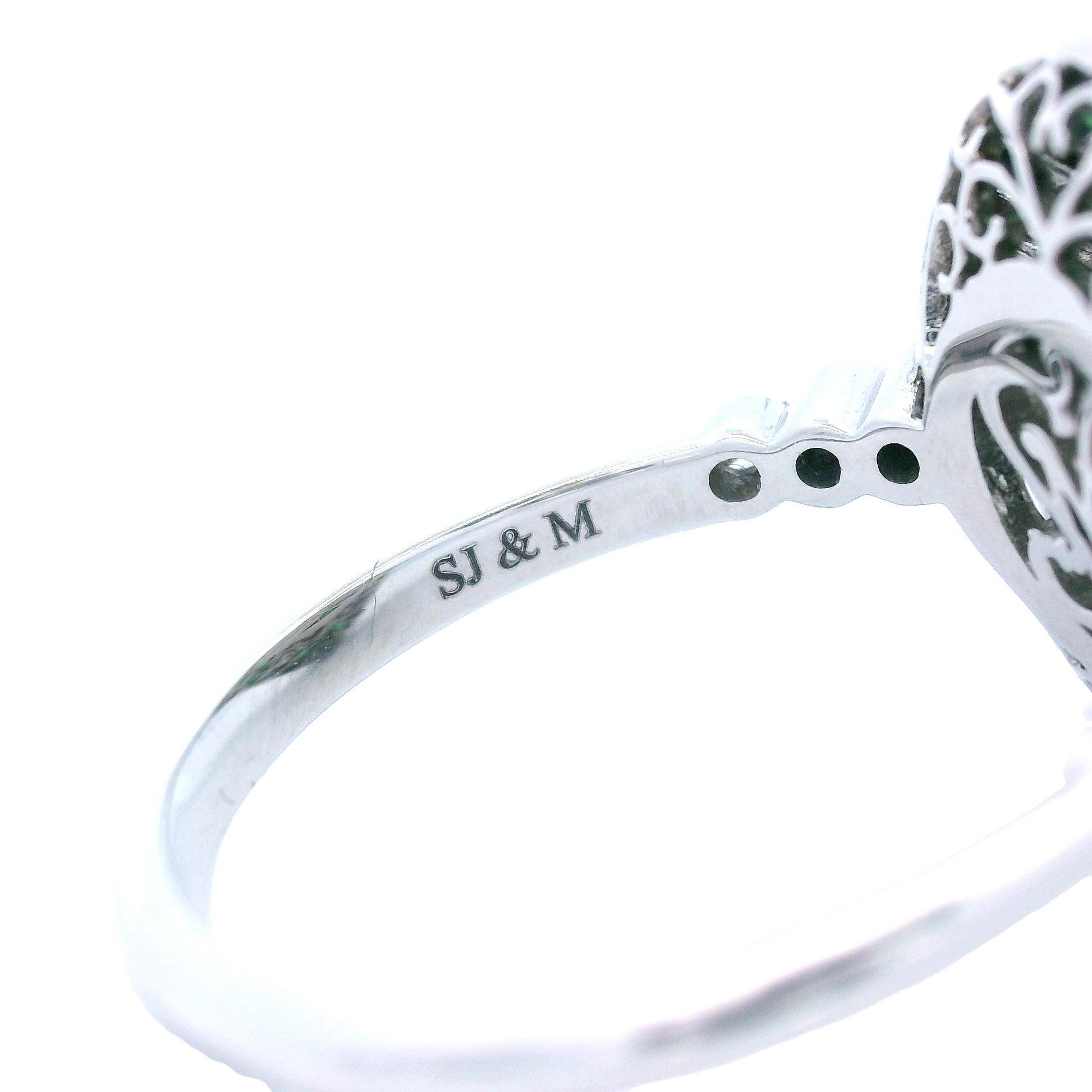 Contemporary Platinum Tsavorite and Diamond Ring