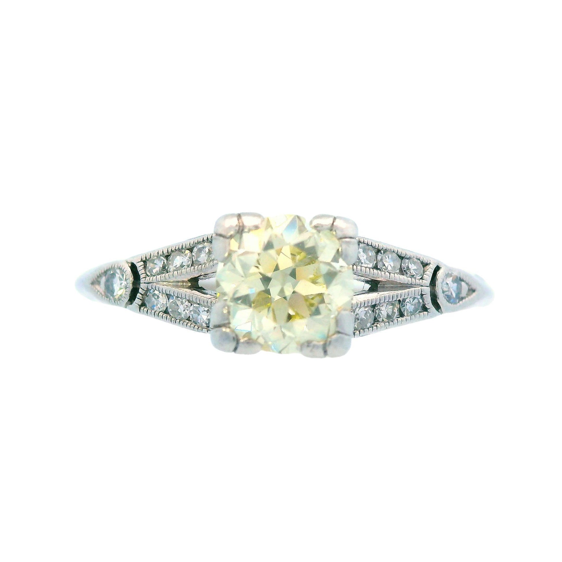 Art Deco Platinum and Fancy Yellow Diamond Engagement Ring