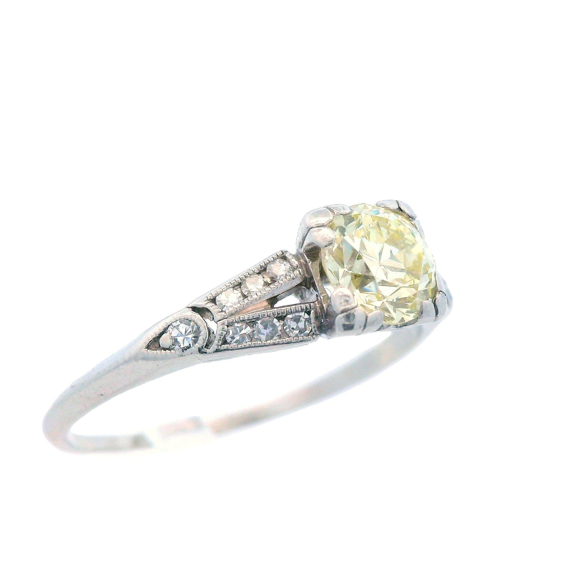 Art Deco Platinum and Fancy Yellow Diamond Engagement Ring