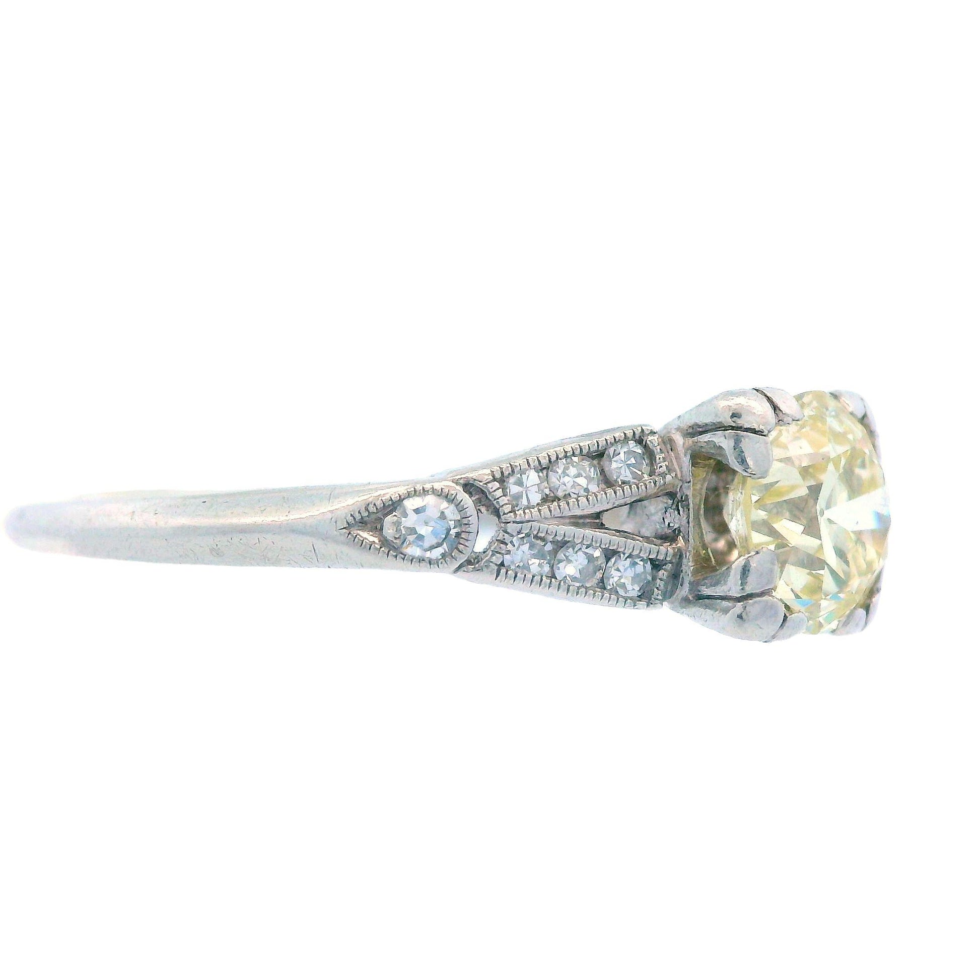 Art Deco Platinum and Fancy Yellow Diamond Engagement Ring