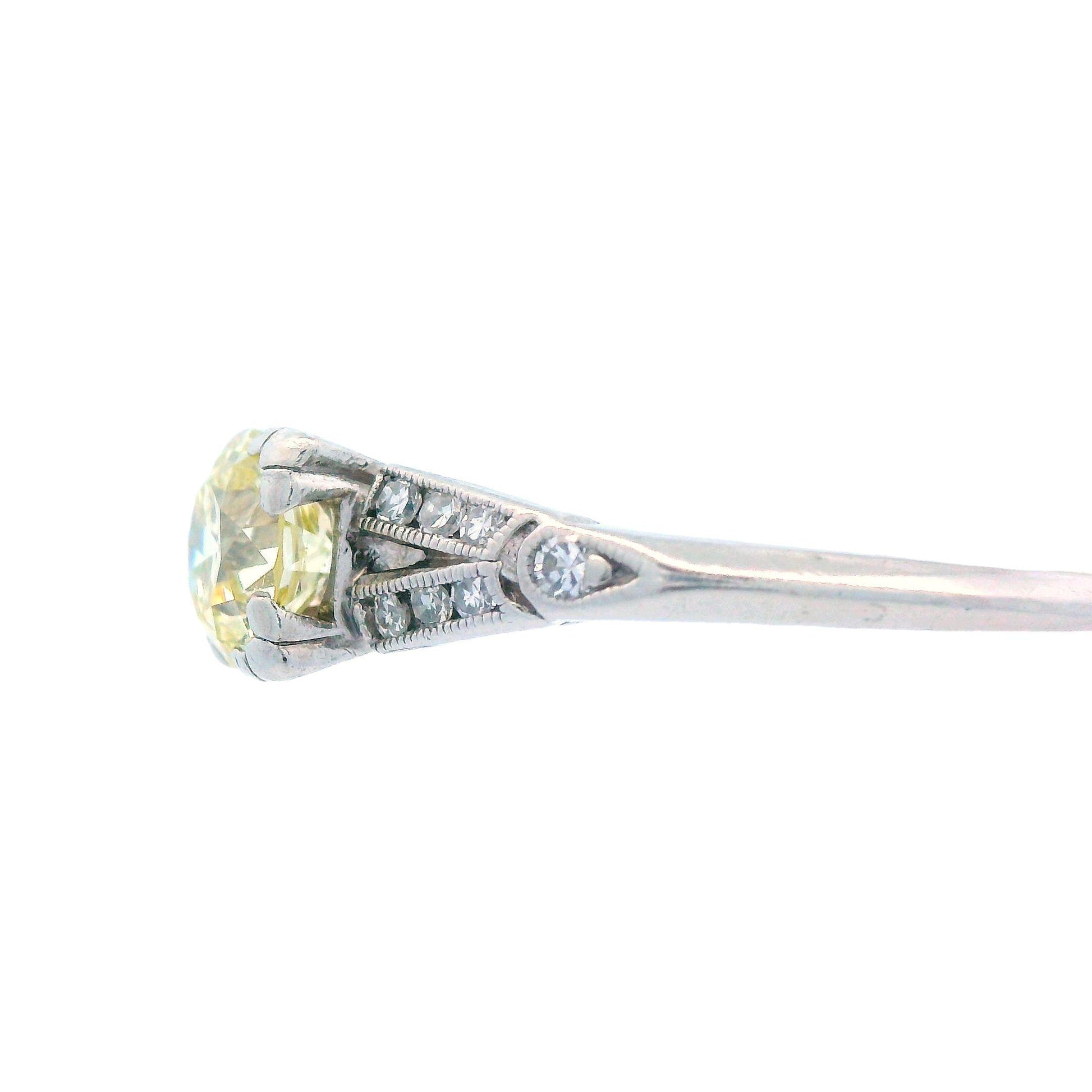 Art Deco Platinum and Fancy Yellow Diamond Engagement Ring