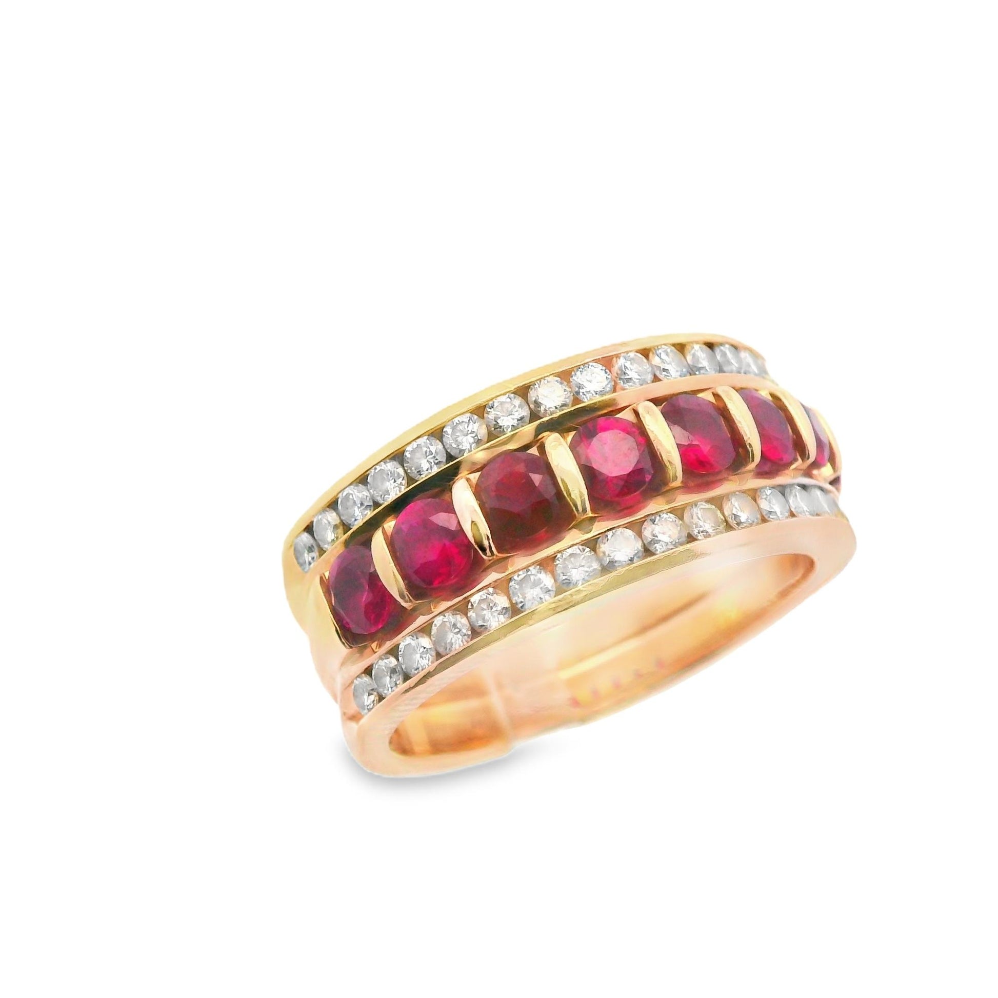 Close-up view of the 14K yellow gold ruby and diamond band ring, focusing on the rich red rubies and sparkling diamonds that create a beautiful contrast