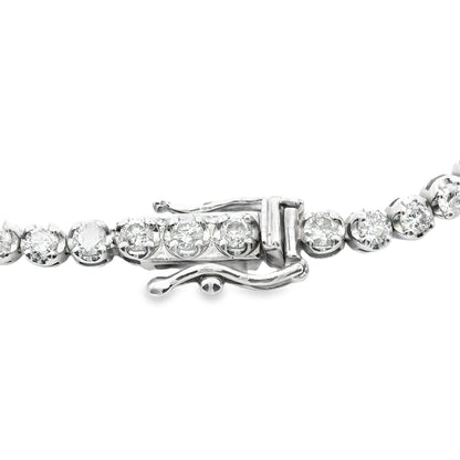 Detailed close-up of the 14K white gold tennis bracelet’s design, featuring perfectly aligned diamonds set in a sleek, polished band for ultimate luxury.