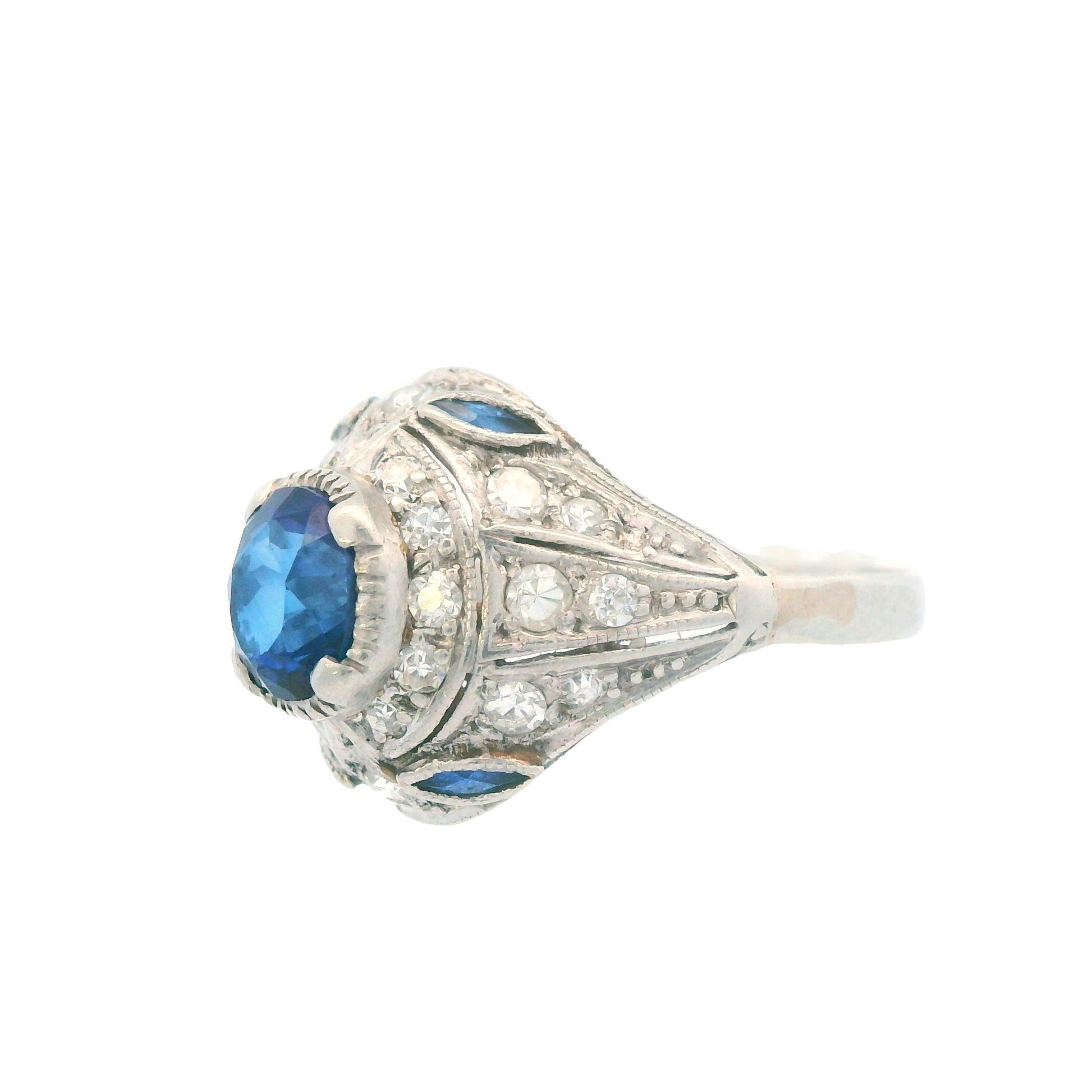 1915 Art Deco Platinum Diamond and Sapphire Ring